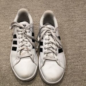 white and black Adidas cloudfoam memory shoes